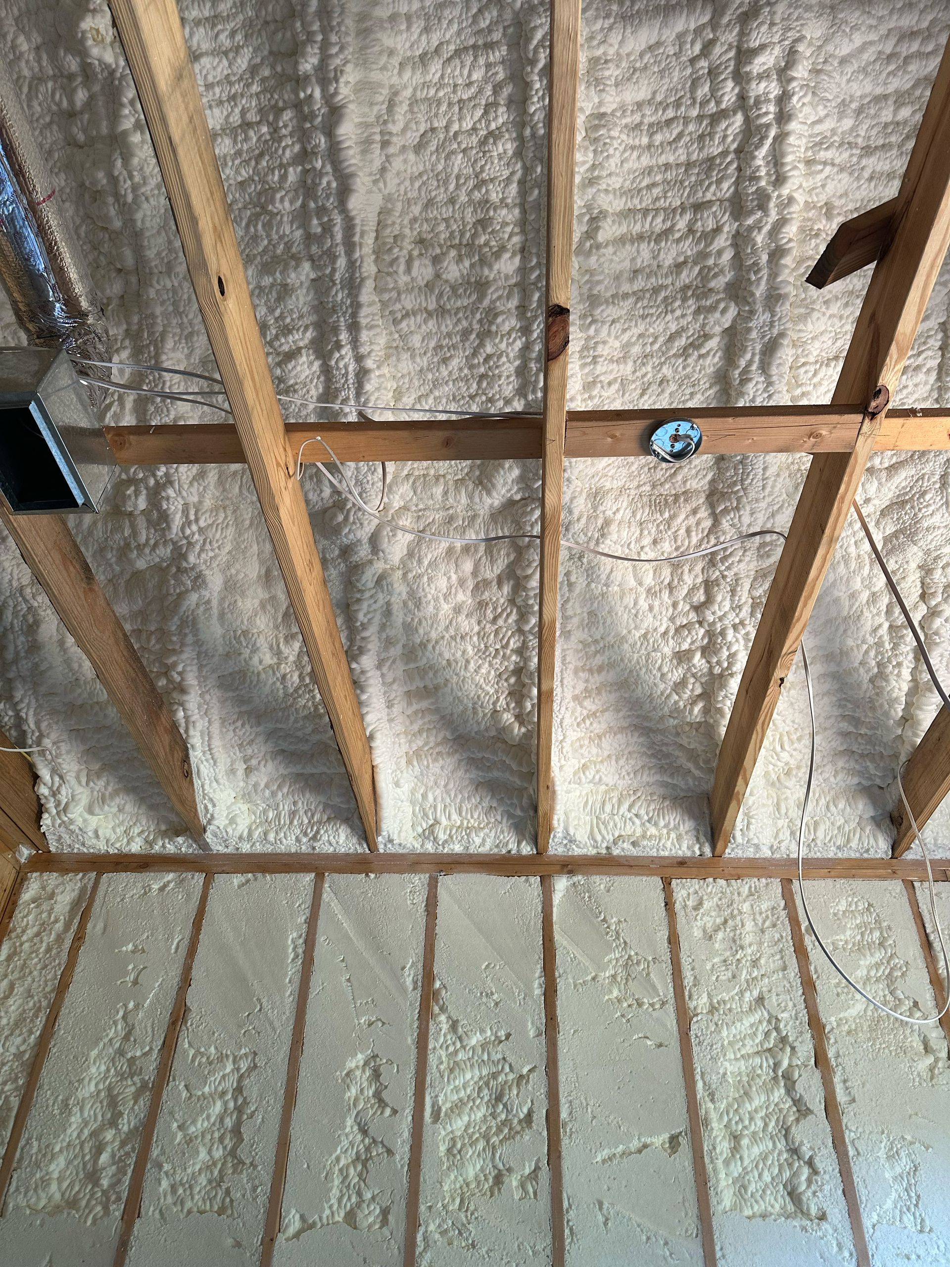 Closed-cell spray foam application in metal building